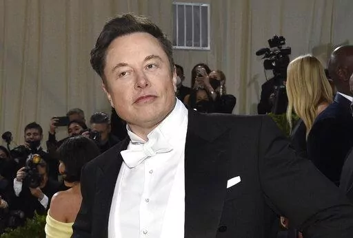 Elon Musk attends The Metropolitan Museum of Art's Costume Institute benefit gala celebrating the opening of the "In America: An Anthology of Fashion" exhibition on May 2, 2022, in New York. Musk is expected to meet with Twitter employees Thursday, June 16, 2022 in an apparent effort to assuage concerns about his $44 billion deal to acquire the social platform. (Photo by Evan Agostini/Invision/AP)