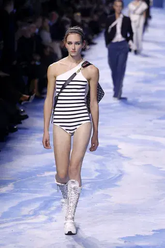 A model wears a creation as part of the Christian Dior Spring/Summer 2025 collection presented Tuesday, Sept. 24, 2024 in Paris. (Photo by Vianney Le Caer/Invision/AP)