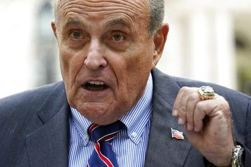 Former New York City Mayor Rudy Giuliani speaks during a news conference June 7, 2022, in New York. The Georgia investigation into potential criminal interference in the 2020 election is heating up. Prosecutors are trying to force allies and advisers of former President Donald Trump to come to Atlanta to testify before a special grand jury. (AP Photo/Mary Altaffer, File)