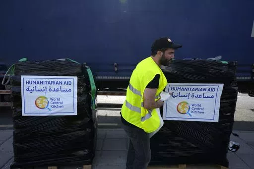 A member of the World Central Kitchen prepares a pallet with the humanitarian aid for transport to the port of Larnaca from where it will be shipped to Gaza, at a warehouse near Larnaca, Cyprus, on March 13, 2024. World Central Kitchen, the food charity founded by celebrity chef José Andrés, called a halt to its work in the Gaza Strip after an apparent Israeli strike killed seven of its workers, mostly foreigners. (AP Photo/Petros Karadjias, File)