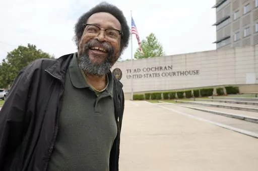 Civil rights activist and Jackson resident Frank Figgers prepares to enter the Thad Cochran U.S. Courthouse in Jackson, Miss., Monday, May 22, 2023. Figgers opposes a Mississippi law that would create a court in part of Jackson with a judge and prosecutors who would be appointed rather than elected. (AP Photo/Rogelio V. Solis, File)