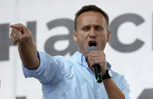 Russian opposition activist Alexei Navalny gestures while speaking to a crowd during a political protest in Moscow, Russia on July 20, 2019. Associates of imprisoned Russian opposition leader Alexei Navalny say he has been located at a prison colony above the Arctic Circle nearly three weeks after contact with him was lost. Navalny, the most prominent foe of Russian President Vladimir Putin, is serving a 19-year sentence on charges of extremism. (AP Photo/Pavel Golovkin, File)