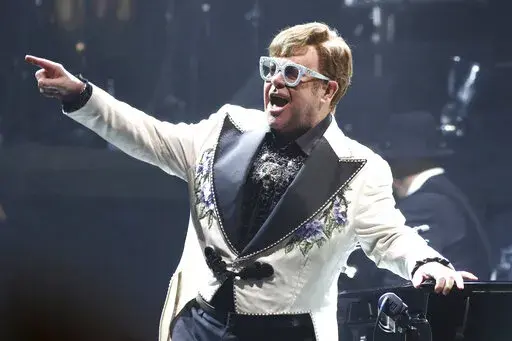 Elton John performs at Madison Square Garden during his Farewell Yellow Brick Road Tour on Tuesday, Feb. 22, 2022, in New York.   John credits Ryan White and his family with saving his life. The singer told the crowd at his concert at Gainbridge Fieldhouse in Indianapolis on Friday, April 1,  that spending time around White’s family caused him to make changes in his life.  White died in Indianapolis at age 18 on April 8, 1990. He had contracted HIV years earlier through a tainted blood transfu