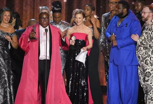 Michael R. Jackson, second left, accepts the award for best new musical for "A Strange Loop" at the 75th annual Tony Awards on Sunday, June 12, 2022, at Radio City Music Hall in New York. (Photo by Charles Sykes/Invision/AP)