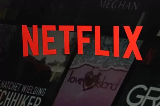 The Netflix logo is shown in this photo from the company's website, in New York, Feb. 2, 2023. Since late last century and the early days of the web, providers of digital media like Netflix and Spotify have had a free pass when it comes to international taxes on films, video games and music that are shipped across borders through the internet. But now, a global consensus on the issue may be starting to crack. (AP Photo/Richard Drew, File)