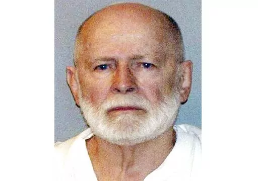 This June 23, 2011, file booking photo provided by the U.S. Marshals Service shows James "Whitey" Bulger. Three men, including a Mafia hitman, have been charged in the killing of Bulger in a West Virginia prison. The Justice Department announced the charges against Fotios "Freddy" Geas, Paul J. DeCologero and Sean McKinnon on Thursday, Aug. 18, 2022. (U.S. Marshals Service via AP, File)