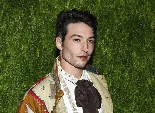 Ezra Miller attends the 15th annual CFDA/Vogue Fashion Fund event at the Brooklyn Navy Yard in New York, Nov. 5, 2018. According to a report from the Vermont State Police on Monday, Aug. 8, 2022, Miller has been charged with felony burglary in Stamford, Vt., the latest in a string of recent incidents involving the embattled star of “The Flash.” (Photo by Evan Agostini/Invision/AP, File)