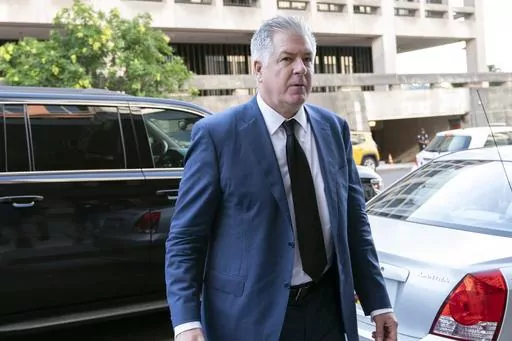 Attorney M. Evan Corcoran arrives at federal court in Washington, July 22, 2022. (AP Photo/Jose Luis Magana, File)
