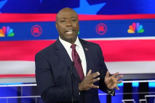 Sen. Tim Scott, R-S.C., speaks during a Republican presidential primary debate, Nov. 8, 2023, in Miami. Scott, a 2024 vice presidential contender for GOP frontrunner former President Donald Trump's ticket, is treading carefully on questions about whether he would have certified the 2020 election if he had been vice president at the time. Scott in a pair of Sunday, Feb. 18, television interviews, would not say if he would have acted differently than Vice President Mike Pence. (AP Photo/Rebecca Bl