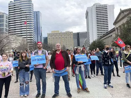 Advocates gather for a rally at the state Capitol complex in Nashville, Tenn., to oppose a series of bills that target the LGBTQ community, Tuesday, Feb. 14, 2023. Lawmakers are considering efforts to ban gender-affirming care for transgender minors, restrict where certain drag shows can take place and bar private companies that manage care for Tennessee's Medicaid program from contracting with the state if they cover gender-transitioning care. (AP Photo/Jonathan Mattise)