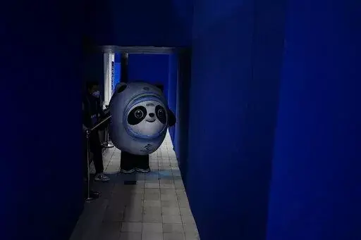 Bing Dwen Dwen, the Olympics mascot walks at the curling venue ahead of the Beijing Winter Olympics, Feb. 2, 2022, in Beijing. (AP Photo/Brynn Anderson)