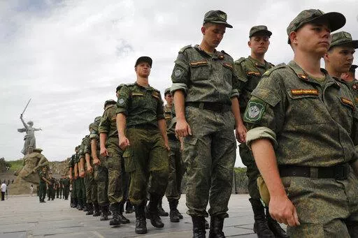 Russian army soldiers march during an action in support for the soldiers involved in the military operation in Ukraine, at the Mamaev Kurgan, a World War II memorial in Volgograd, Russia, July 11, 2022. Russian President Vladimir Putin has on Thursday, Aug. 25 ordered the Russian military to increase the size of the country's armed forces by 137,000 amid Moscow’s military action in Ukraine. (AP Photo/Alexandr Kulikov, file)