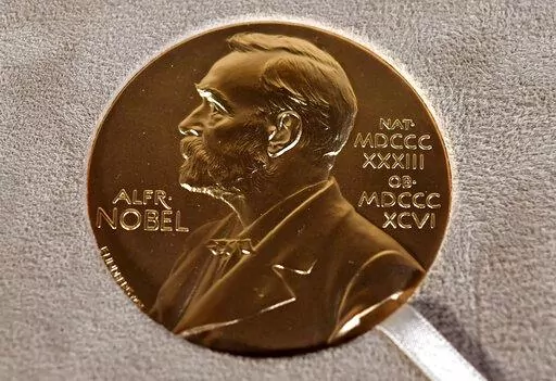 A Tuesday, Dec. 8, 2020 file photo of a Nobel medal displayed during a ceremony in New York. (Angela Weiss/Pool Photo via AP, File)