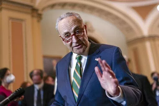 Senate Majority Leader Chuck Schumer, D-N.Y., meets with reporters following a Democratic Caucus meeting, at the Capitol in Washington, Tuesday, April 5, 2022. (AP Photo/J. Scott Applewhite)