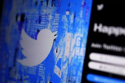 The Twitter splash page is seen on a digital device, Monday, April 25, 2022, in San Diego. By hiring Linda Yaccarino as Twitter’s new CEO, Friday, May 12, 2023, Elon Musk is welcoming a veteran ad executive to the helm of the social media site. (AP Photo/Gregory Bull, File)