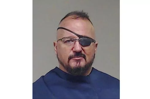 This photo, provided by the Collin County Sheriff's Office shows Stewart Rhodes. A federal judge refused on Friday, Feb. 18, 2022, to free Oath Keepers founder Rhodes from jail while he awaits trial on charges that he plotted with other members of his far-right militia group to attack the U.S. Capitol to stop Congress from certifying President Joe Biden's electoral victory. (Collin County Sheriff's Office via AP, File)