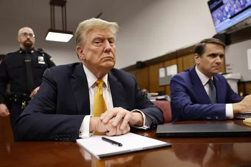 Former President Donald Trump sits in the courtroom for his trial at the Manhattan criminal court, Tuesday, May 21, 2024, in New York. As Trump attacked the U.S. criminal justice system following his guilty verdict, analysts say that his allegations could be useful to Russian President Vladimir Putin and other autocrats. (Michael M. Santiago/Pool Photo via AP, File)