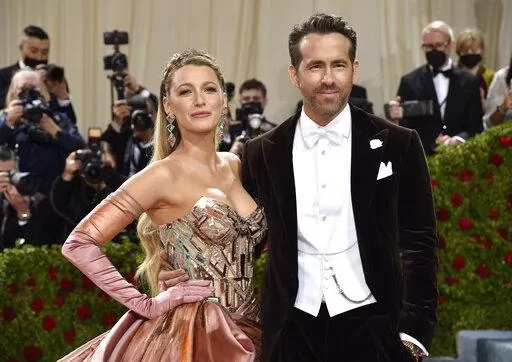 Blake Lively, left, and Ryan Reynolds attend The Metropolitan Museum of Art's Costume Institute benefit gala on Monday, May 2, 2022, in New York. Parties are back, and they've brought with them the potential for some dress code chaos. White tie, black tie, black tie creative/festive, semi-formal. Pre-pandemic guidelines for attire in an exhausted world more used to sweats and sneakers may take some extra re-entry energy. (Photo by Evan Agostini/Invision/AP, File)