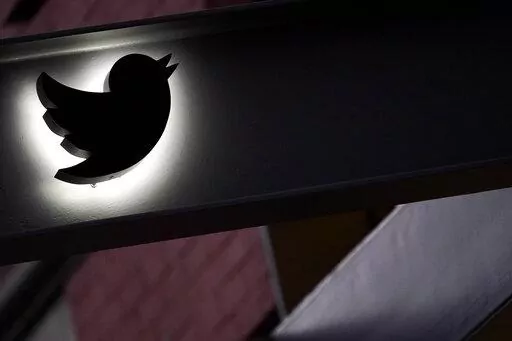 The Twitter logo is seen on the awning of the building that houses the Twitter office in New York, Wednesday, Oct. 26, 2022.  While amount of chaos is expected after a corporate takeover, as are layoffs and firings, Elon Musk’s murky plans for Twitter — especially its content moderation, misinformation and hate speech policies — are raising alarms about where one of the world’s most high-profile information ecosystems is headed.   (AP Photo/Mary Altaffer, File)