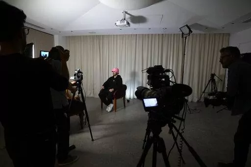 Oleh Psiuk, frontman of Ukraine's Kalush Orchestra talks during an interview in Turin, Italy, Thursday May 5, 2022. Ukrainian band Kalush Orchestra’s upbeat, melodic entry to this month’s Eurovision Song Contest was written as a tribute to the frontman’s mother. But since the Russian invasion of Ukraine, the song called “Stefania” has become an anthem to the country's war-ravaged motherland.  (AP Photo/Antonio Calanni)