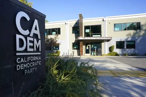 The John L. Burton California Democratic Party Headquarters is seen in Sacramento, Calif., Friday, July 16, 2021. In a plea agreement announced Friday, May 27, 2022, Ian Benjamin Rogers, of Napa, accused of plotting to blow up the Burton building, pleaded guilty to federal charges of conspiracy to destroy a building with fire or explosives, possessing an unregistered explosive device and possession of a machine gun. Under the agreement Rogers Could face seven-to-nine years in prison. (AP Photo/R