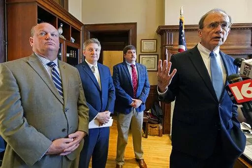 Republican Lt. Gov. Delbert Hosemann, right, speaks about proposed legislation that standardizes some sentencing for a number of crimes, including motor vehicle theft, fleeing law enforcement and resisting arrest, Thursday, Jan. 26, 2023, at the Mississippi Capitol in Jackson. Attending the briefing, were Senate Judiciary A Committee Chairman Brice Wiggins, R-Pascagoula, left, Senate Judiciary B Committee vice chairman Jeremy England, R-Vancleave, rear, and Senate Judiciary B Committee chairman 