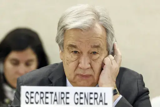U.N. Secretary-General Antonio Guterres listens to a speech during the opening of the High-Level Segment of the 55th session of the Human Rights Council at the European headquarters of the United Nations in Geneva, Switzerland, on Feb. 26, 2024. Guterres appealed for funding Friday, July 12, 2024, for the beleaguered U.N. agency helping Palestinian refugees in Gaza and elsewhere in the Middle East, accusing Israel of issuing evacuation orders that force Palestinians “to move like human pinball