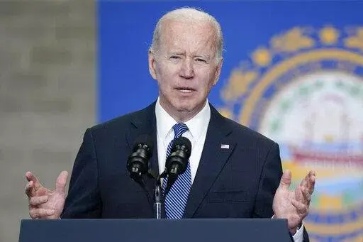 President Joe Biden speaks about his infrastructure agenda at the New Hampshire Port Authority in Portsmouth, N.H., Tuesday, April 19, 2022. (AP Photo/Patrick Semansky)