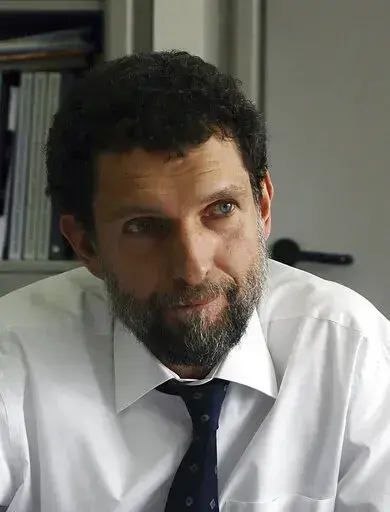 Osman Kavala, a Turkish philanthropist businessman and human rights defender poses for a photo in Istanbul, Turkey, April 29, 2015. A Turkish Court on Monday April 25, 2022, sentenced prominent Turkish civil rights activist and philanthropist Osman Kavala to life in prison without parole, finding him guilty of attempting to overthrow the government in connection with the 2013 mass anti-government protests. (AP Photo/File)