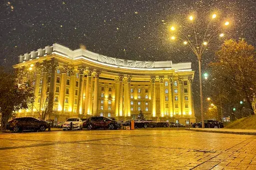 In this undated handout photo released by Ukrainian Foreign Ministry Press Service, the building of Ukrainian Foreign Ministry is seen during snowfall in Kyiv, Ukraine. Ukrainian officials and media reports say a number of government websites in Ukraine are down after a massive hacking attack. While it is not immediately clear who was behind the attacks, they come amid heightened tensions with Russia and after talks between Moscow and the West failed to yield any significant progress this week. 