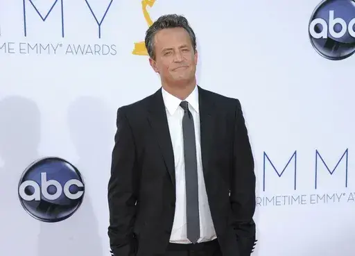 Actor Matthew Perry arrives at the 64th Primetime Emmy Awards in Los Angeles on Sept. 23, 2012. (Photo by Jordan Strauss/Invision/AP, File)