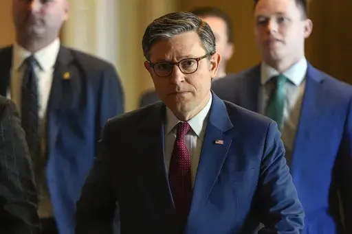 Speaker of the House Mike Johnson, R-La., walks through the Capitol, Monday, March 3, 2025, in Washington. (AP Photo/Julia Demaree Nikhinson)