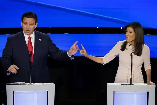 Former UN Ambassador Nikki Haley, right and Florida Gov. Ron DeSantis, left, pointing at each other during the CNN Republican presidential debate at Drake University in Des Moines, Iowa, Jan. 10, 2024. As Republican primary voters prepare to cast ballots for who they believe should lead the U.S. into its future, leading candidates are struggling to discuss key elements of the nation’s past. DeSantis, Haley and former President Donald Trump have all raised eyebrows with rhetoric on the Civil Wa