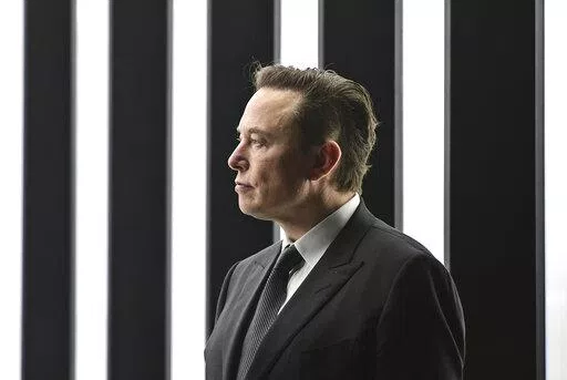 Elon Musk, Tesla CEO, attends the opening of the Tesla factory Berlin Brandenburg in Gruenheide, Germany, March 22, 2022. Elon Musk will be able to include new evidence from a Twitter whistleblower as he fights to get out of his $44 billion deal to buy the social media company, but Musk won’t be able to delay a high-stakes October trial over the dispute, a judge ruled Wednesday, Sept. 7, 2022. (Patrick Pleul/Pool via AP)