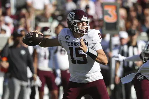 Texas A&M quarterback Conner Weigman (15) throws the ball during the first half of an NCAA college football game against Mississippi State on Saturday, Oct. 19, 2024, in Starkville, Miss. (AP Photo/Randy J. Williams)