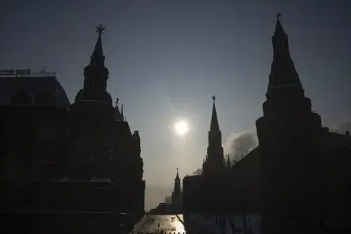 A virtually empty Red Square closed for security reasons prior to Russian President Vladimir Putin's annual state of the nation address, is seen between the Historical Museum, left, and the Kremlin Wall, right, in Moscow, Feb. 21, 2023. U.S. officials say Russia is now the most sanctioned country in the world. But as the war nears its one-year mark, it's clear the sanctions didn't pack the instantaneous punch that many had hoped. (AP Photo/Alexander Zemlianichenko, File)