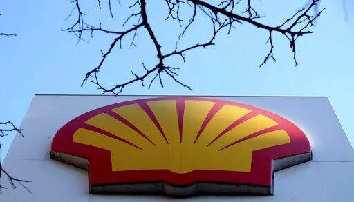 This Wednesday, Jan. 20, 2016 file photo shows the Shell logo at a petrol station in London. On Friday, Feb. 12, 2021, Energy giant Shell said Tuesday, March 8, 2022 that it will stop buying Russian oil and natural gas and shut down its service stations, aviation fuels and other operations in the country amid international pressure for companies to sever ties over the invasion of Ukraine. (AP Photo/Kirsty Wigglesworth, File)
