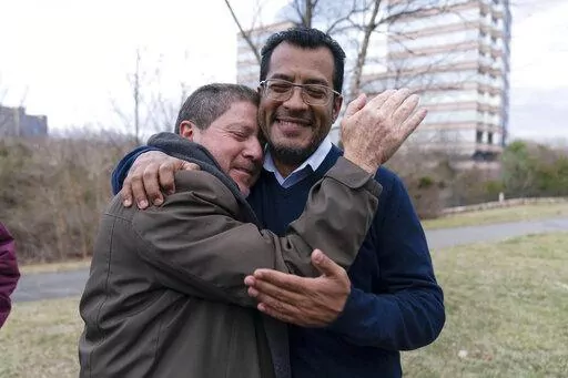 Nicaraguan opposition leader Felix Maradiaga is welcomed by a supporter in Chantilly, Va., Thursday, Feb. 9, 2023. Maradiaga was among some 222 prisoners of the government of Nicaraguan President Daniel Ortega who arrived from Nicaragua to the Washington Dulles International Airport on Thursday, after an apparently negotiated release. (AP Photo/Jose Luis Magana)