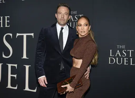 Actor Ben Affleck, left, and actor-singer Jennifer Lopez attend the premiere of "The Last Duel" on Oct. 9, 2021, in New York. (Photo by Evan Agostini/Invision/AP, File)