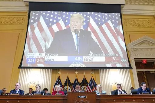 A video exhibit plays as the House select committee investigating the Jan. 6 attack on the U.S. Capitol continues to reveal its findings of a year-long investigation, at the Capitol in Washington, Monday, June 13, 2022. (AP Photo/Susan Walsh)
