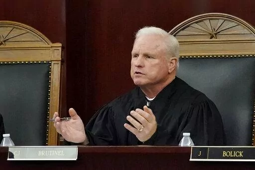 Arizona Supreme Court Chief Justice Robert M. Brutinel speaks during oral arguments, in Phoenix on April 20, 2021. Arizona victims of long-ago child sex abuse can proceed with lawsuits against groups like the Boy Scouts of America following a recent decision by the state Supreme Court that rejected claims that a 2019 state law extending victims' right to sue was unconstitutional. (AP Photo/Matt York, File)