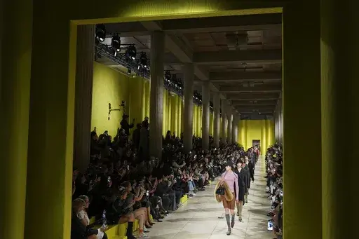 Models wear creations as part of the Miu Miu Fall/Winter 2025-2026 Womenswear collection presented Tuesday, March 11, 2025. in Paris. (Photo by Scott A Garfitt/Invision/AP)