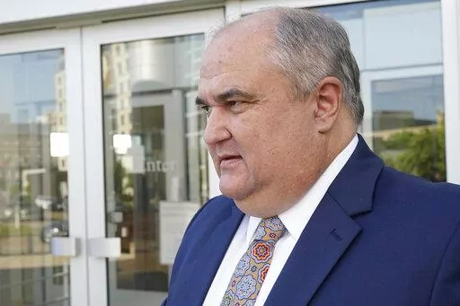 John Davis, former director of the Mississippi Department of Human Services, leaves the Thad Cochran United States Courthouse in Jackson, Miss., on Sept. 22, 2022. A federal judge signed an order Friday, Jan. 27, 2023, to indefinitely delay sentencing of the former Mississippi welfare director in a case about misspending money that was intended to help needy families in one of the poorest states in the U.S. (AP Photo/Rogelio V. Solis, File)