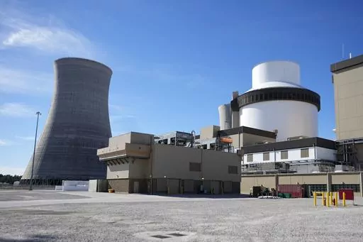 Unit 3’s reactor and cooling tower stand at Georgia Power Co.'s Plant Vogtle nuclear power plant on Jan. 20, 2023, in Waynesboro, Ga. Company officials announced Wednesday, May 24, 2023, that Unit 3, one of two new reactors at the site, would reach full power in coming days, after years of delays and billions in cost overruns. (AP Photo/John Bazemore, File)