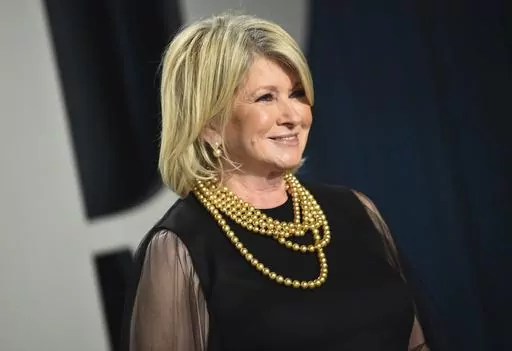 Martha Stewart arrives at the Vanity Fair Oscar Party, Feb. 9, 2020, in Beverly Hills, Calif. At 81, Stewart isn't slowing down and some might say she's heating up as one of Sports Illustrated's 2023 cover models. In an Instagram post Monday, May 15, 2023, the businesswoman and media personality wrote she hopes the cover inspires people “to try new things, no matter what stage of life you're in.” (Photo by Evan Agostini/Invision/AP, File)