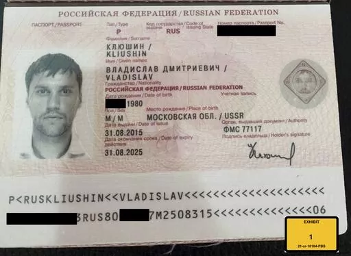 This image provided by the U.S. Attorney's Office, shows a Russian passport of Vladislav Klyushin, part of the government evidence entered into the record as exhibits in Klyushin's trial. Klyushin was sentenced Thursday, Sept. 7, 2023, to nine years in prison for his role in a nearly $100 million stock market cheating scheme that relied on secret earnings information stolen through the hacking of U.S. computer networks. ( U.S. Attorney's Office via AP)