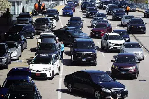 Heavy traffic is seen at O'Hare International Airport in Chicago, Monday, April 15, 2024. Relentlessly rising auto insurance rates are squeezing car owners and stoking inflation. Auto insurance rates rose 2.6% in March and are up 22% from a year ago. (AP Photo/Nam Y. Huh, File)