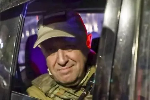 Yevgeny Prigozhin, the owner of the Wagner Group military company, looks out from a military vehicle on a street in Rostov-on-Don, Russia, Saturday, June 24, 2023, leaving an area of the headquarters of the Southern Military District. Kremlin spokesman Dmitry Peskov said that Prigozhin's troops who joined him in the uprising will not face prosecution and those who did not will be offered contracts by the Defense Ministry. After the deal was reached Saturday, Prigozhin ordered his troops to halt 