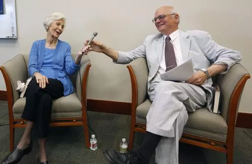 Former first lady of Mississippi Elise Varner Winter, left, reacts to questions from Elbert Hilliard, former director of the Mississippi Department of Archives and History, May 20, 2015, in Jackson, Miss. Hillard, who led the department from 1973 to 2004, died Sunday, March 17, 2024, at age 87. (AP Photo/Rogelio V. Solis, File)