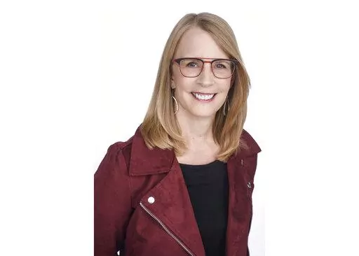 This undated file photo provided by NerdWallet shows Liz Weston, a columnist for personal finance website NerdWallet.com. Inflation has a way of affecting nearly every aspect of our finances. Big jumps in tax brackets could save you money, especially if you’re working and your raises — like those of most workers — haven’t kept pace with inflation. (NerdWallet via AP, File)